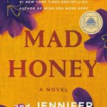 Mad Honey by Jodi Picoult and Jennifer Finney Boylan book cover with gold cover and purple flowers